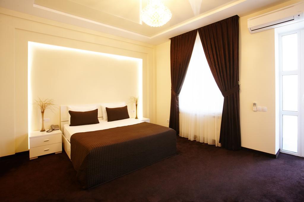 Central Park Apartments Кишинев Стая снимка